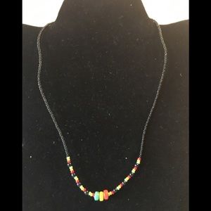 Black, red and green beaded necklace 9” in length